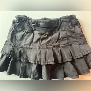 Black Ivivva skirt with ruffles. size XS/S or 4.